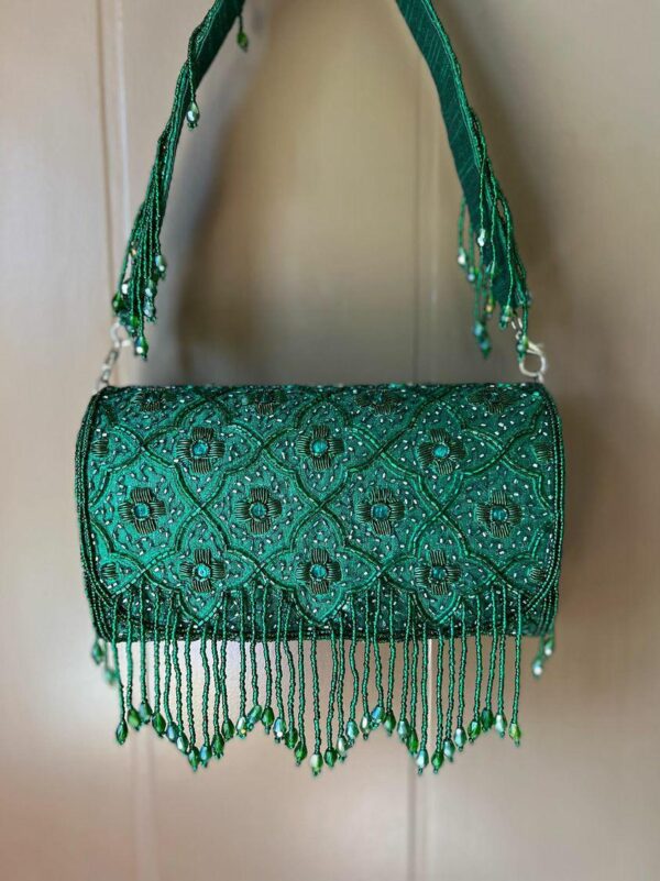 Handcrafted clutchpurse with tassels