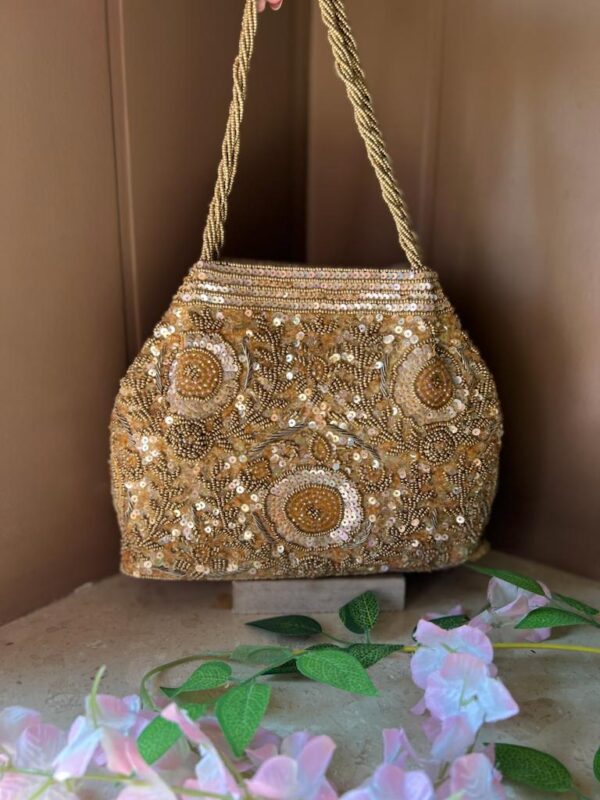 Golden handcrafted purse