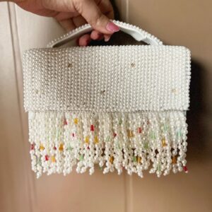 Pearl flap clutch bag