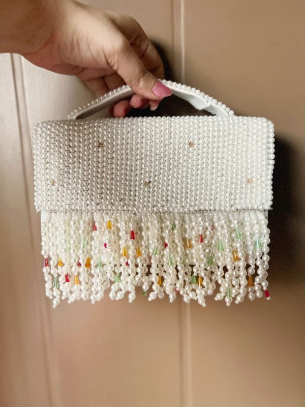 Pearl flap clutch bag