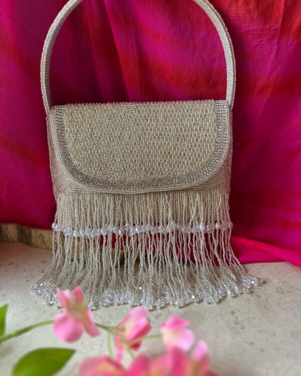 Tassels evening clutch bag