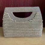 Pearl drops clutch bag