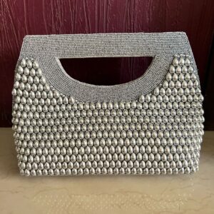 Pearl drops clutch bag