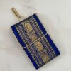 Handcrafted Banarasi brocade mobile sling bag with ethnic design, perfect for carrying essentials at weddings, parties, and casual outings."